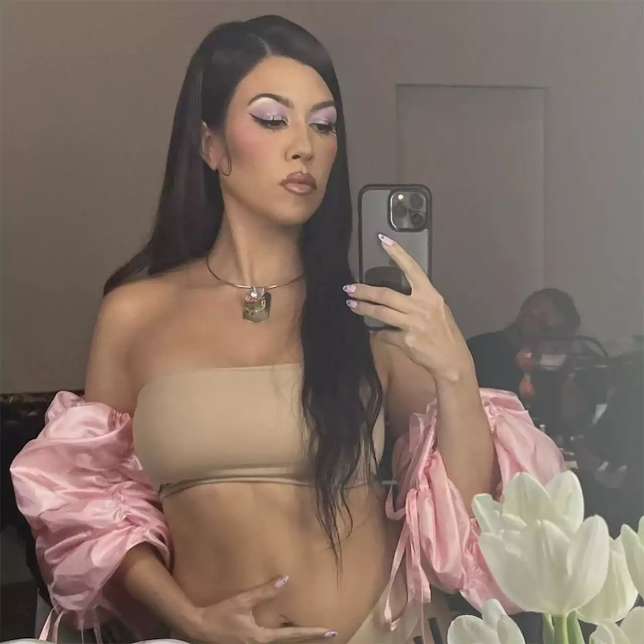 Kourtney Kardashian Claps Back at Pregnancy Comment While Posing in Lingerie - E! Online