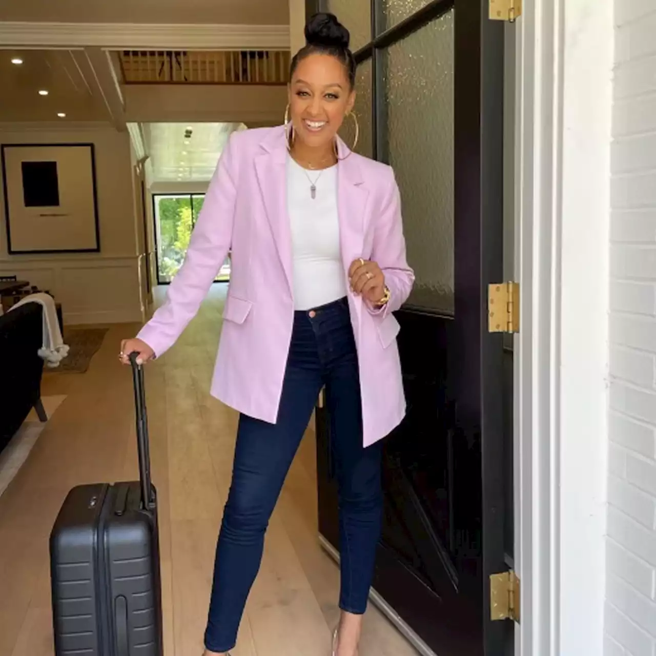 Tia Mowry Shares How You Can Win a $50K Vacation and Her Travel Must-Haves Under $27 - E! Online