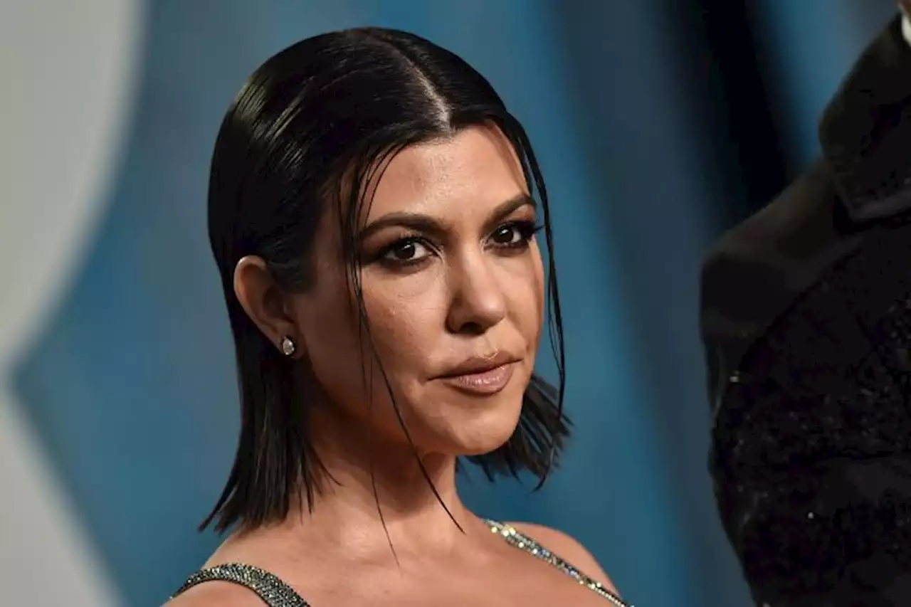 Kourtney Kardashian Claps Back At Pregnancy Speculation After Sharing Lingerie Pics