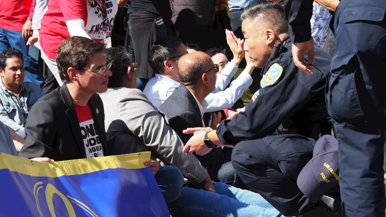 San Francisco airport workers 'arrested and cited' after 'civil disobedience'