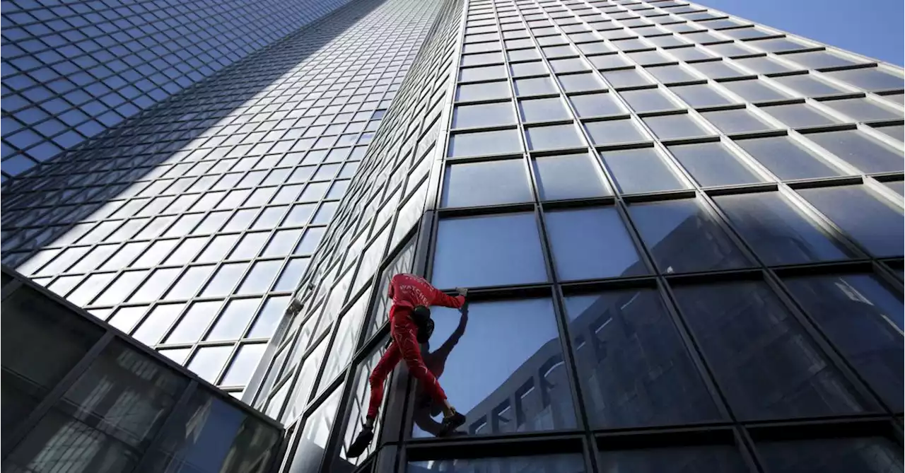 'French Spiderman' climbs Paris skyscraper to mark turning 60