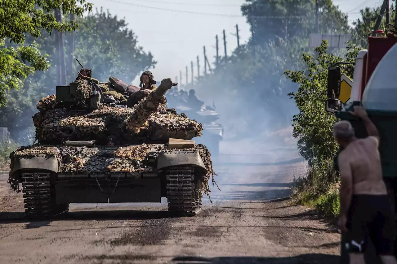 Citing discovery of mass graves, Ukraine presses case for modern tanks