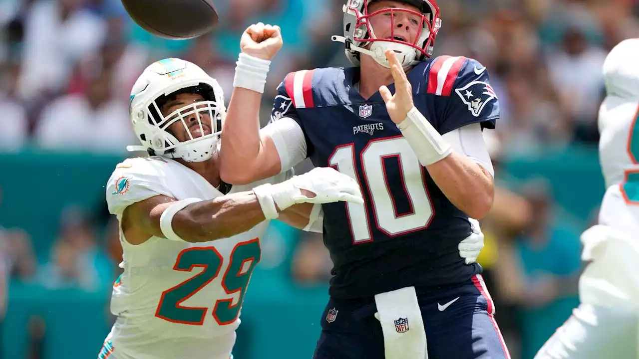 Patriots' offense sputters in season opener — and now Mac Jones has a back injury