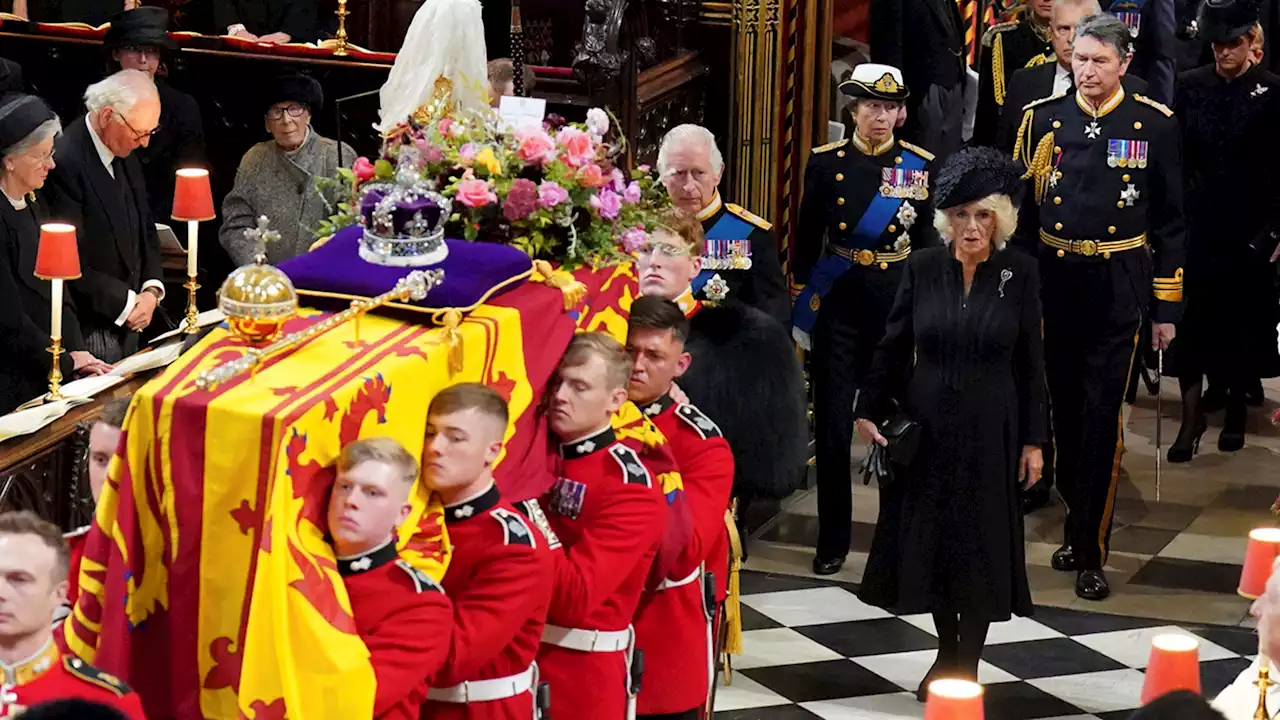 Queen Elizabeth's coffin lowered into Windsor Castle's royal vault after final goodbyes at funeral