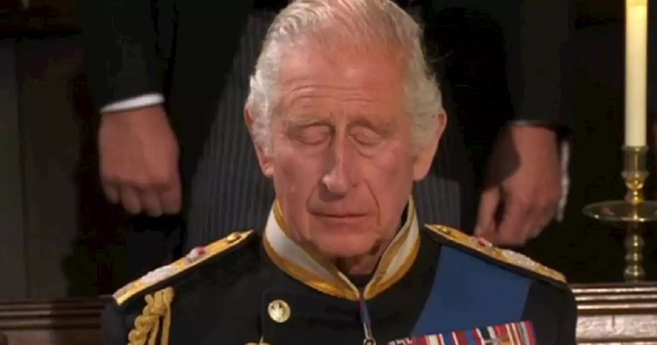 Charles in tears as Queen's coffin is lowered and guests sing God Save The King