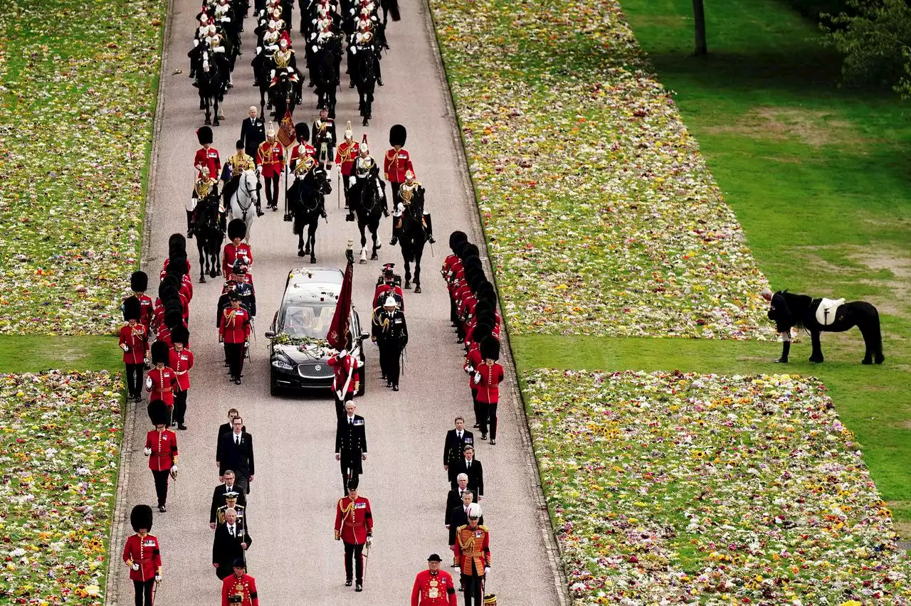 Queen Elizabeth II’s coffin lowered into royal vault at Windsor Castle following state funeral