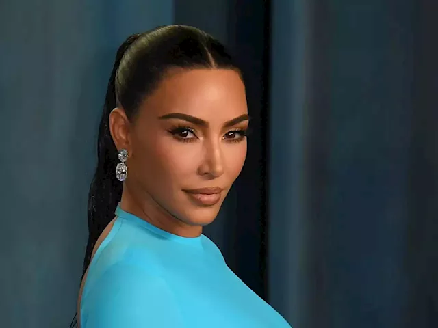 Kim Kardashian Checks Out NYC In Balenciaga Credit Card Earrings -  Fashionista