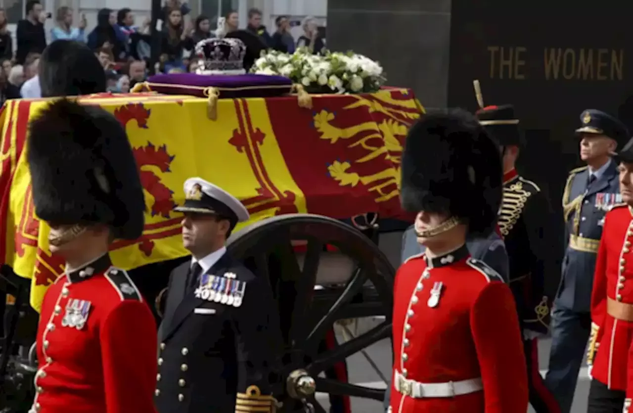 Queen Elizabeth II Laid To Rest In Windsor After Emotional Public Farewell