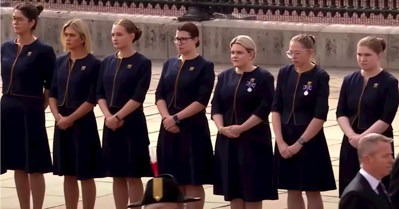 Queen Elizabeth's Staff Line Up to Watch Procession Pass Buckingham Palace