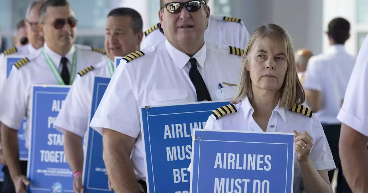 Heading into Labor Day holiday weekend, pilots picket at O’Hare, across the country