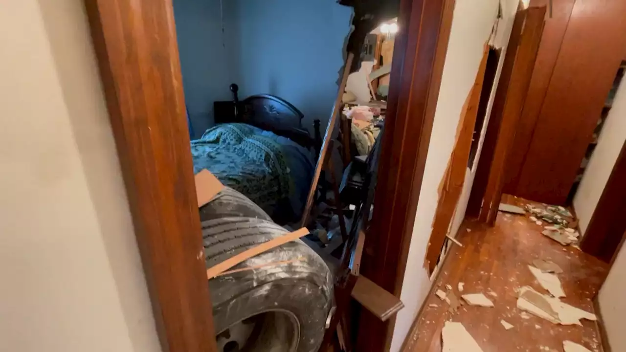 Truck tires fly into woman’s home, crashing through two rooms, narrowly missing homeowner