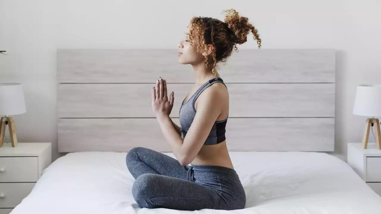 Is there any benefit to doing yoga in bed?