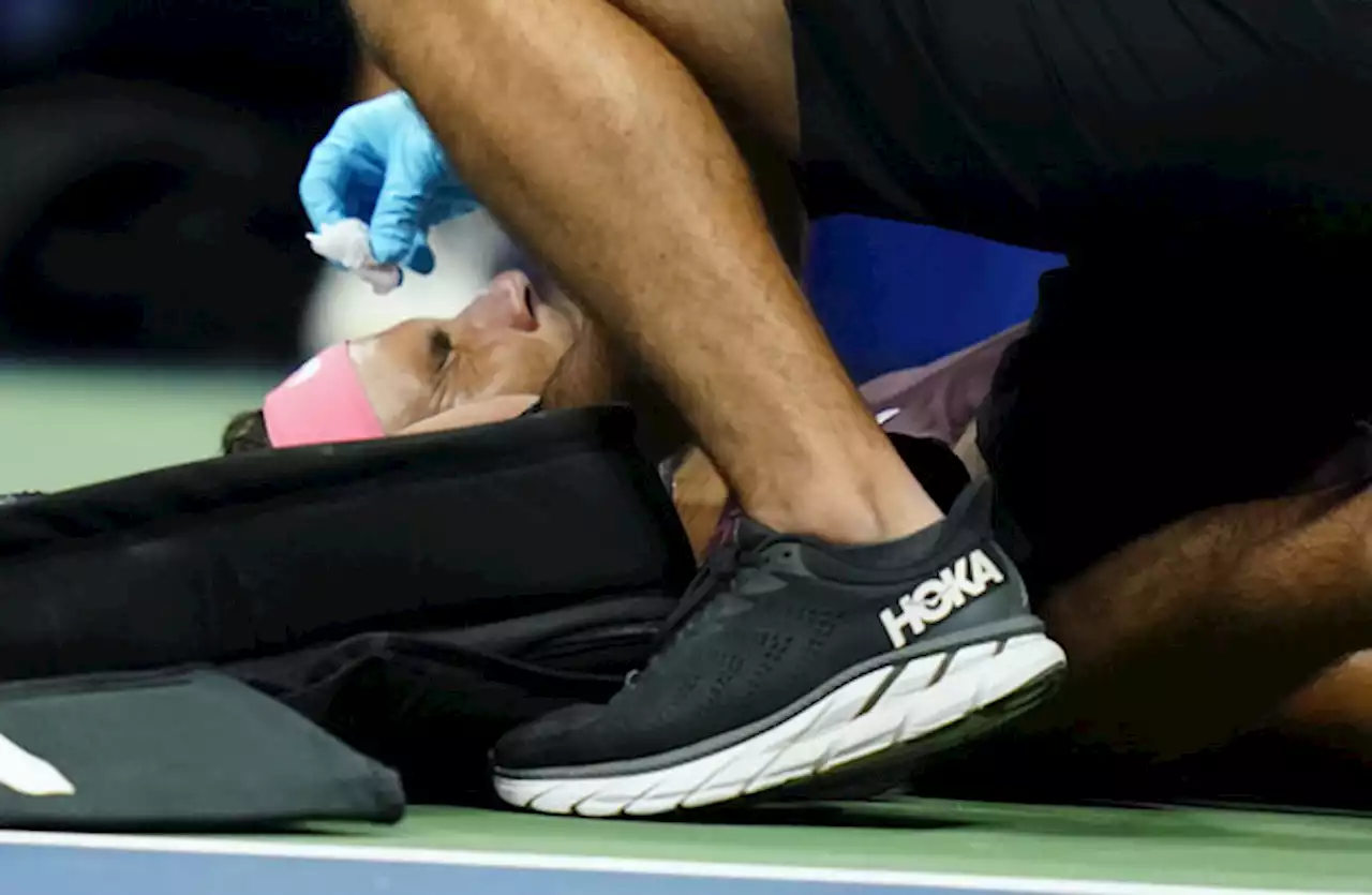 Nadal overcomes self-inflicted injury, Williams sisters lose in doubles