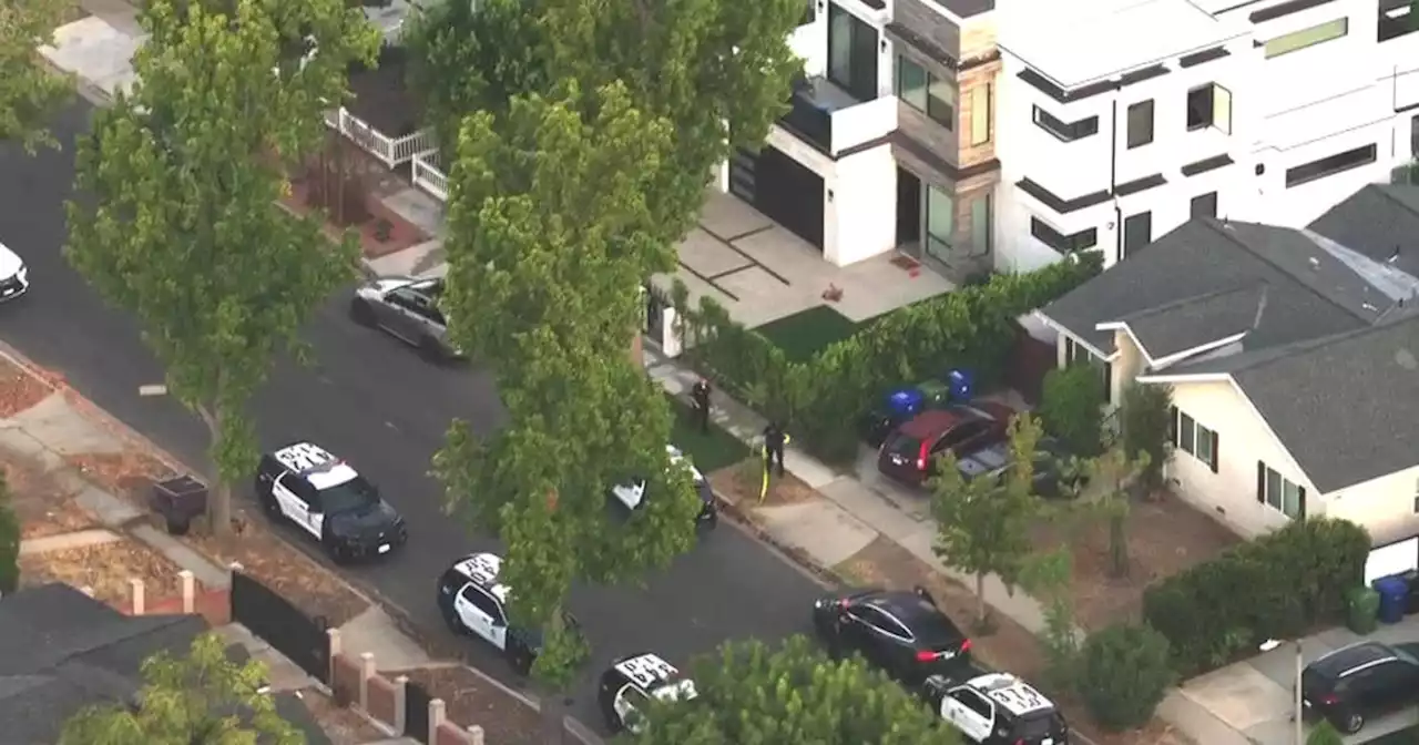 Police searching for gunman who killed a man at an Encino rental home