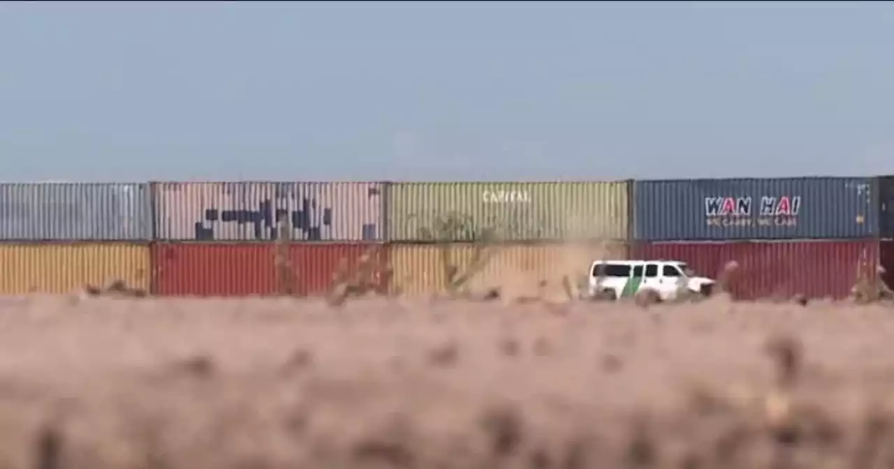 Shipping containers arrive in Nogales to fill border gaps