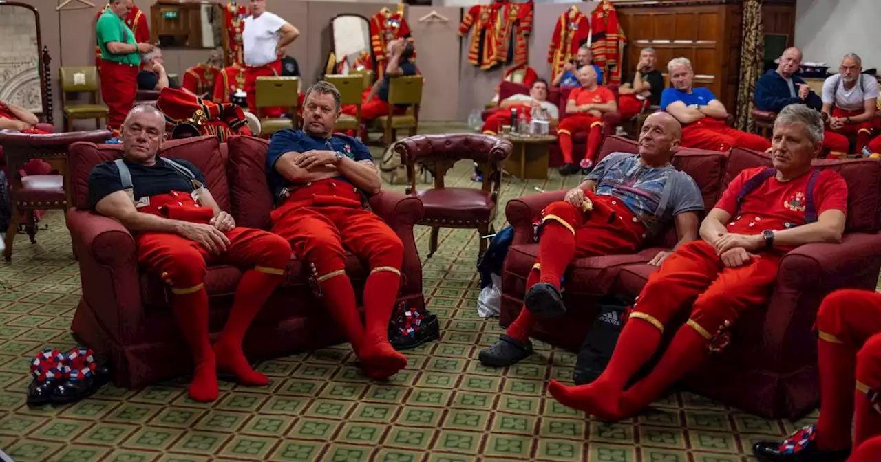 Queen's guards pictured taking a rare break out of uniform after 24-hour roster