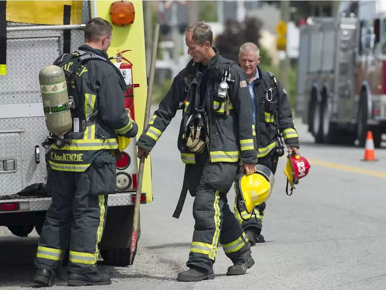 Two men escape Surrey house fire