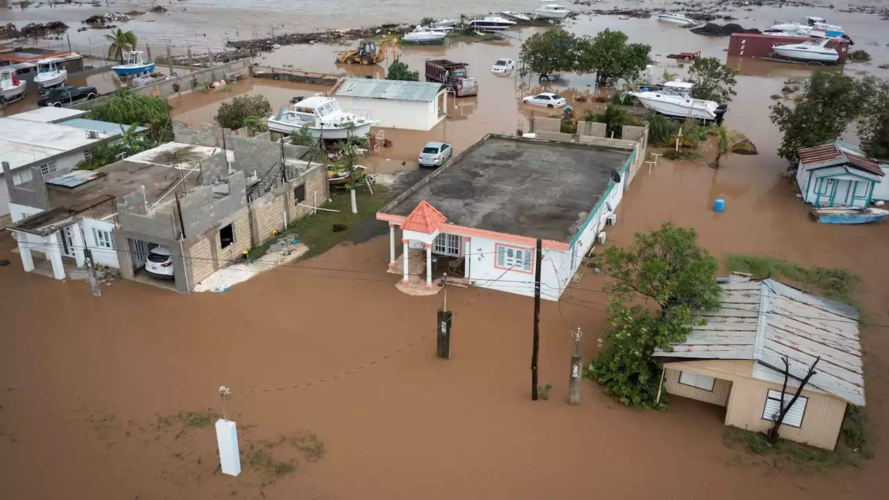 Fiona dumps more rain on Puerto Rico; troops rescue hundreds