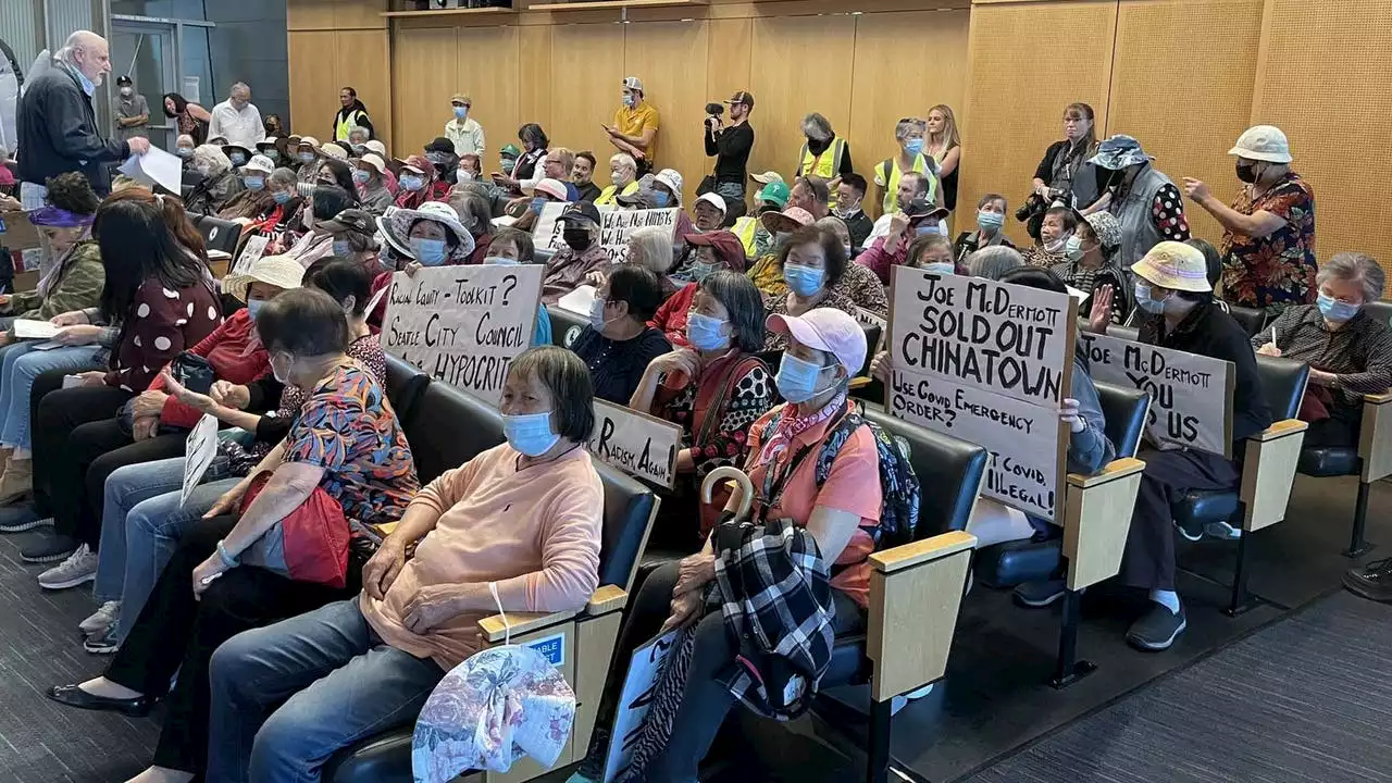 International District residents march on City Hall to stop homeless shelter, services hub