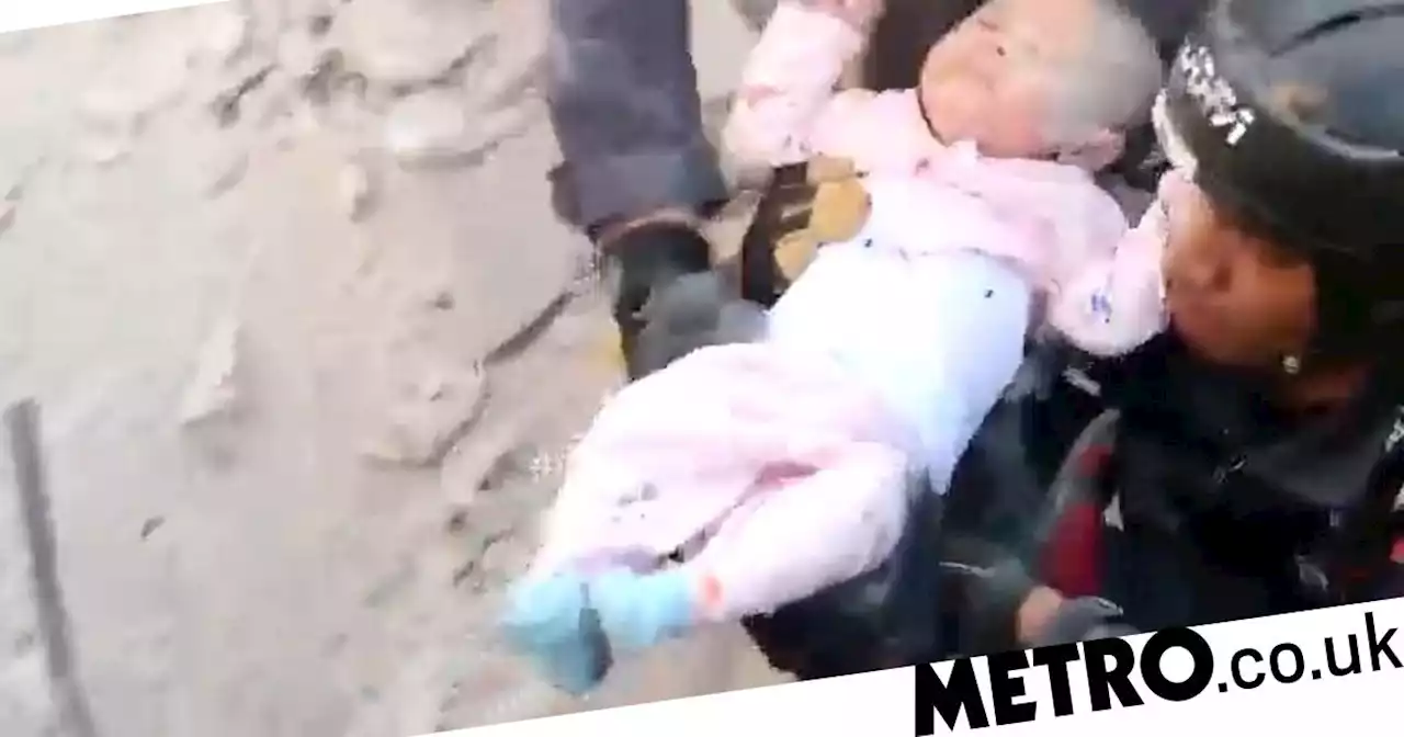 Baby pulled out of rubble alive 30 hours after building collapsed killing 14