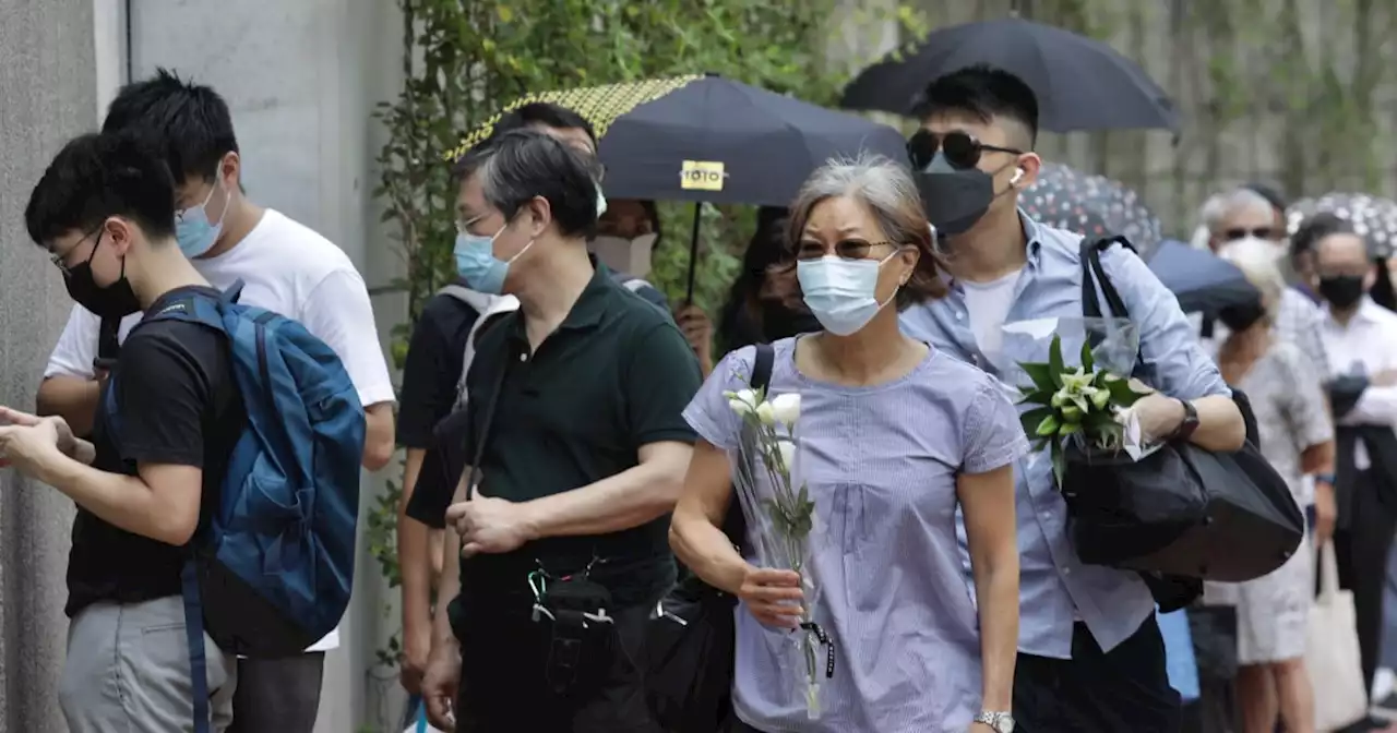 Hong Kong man arrested after paying tribute to Queen Elizabeth II