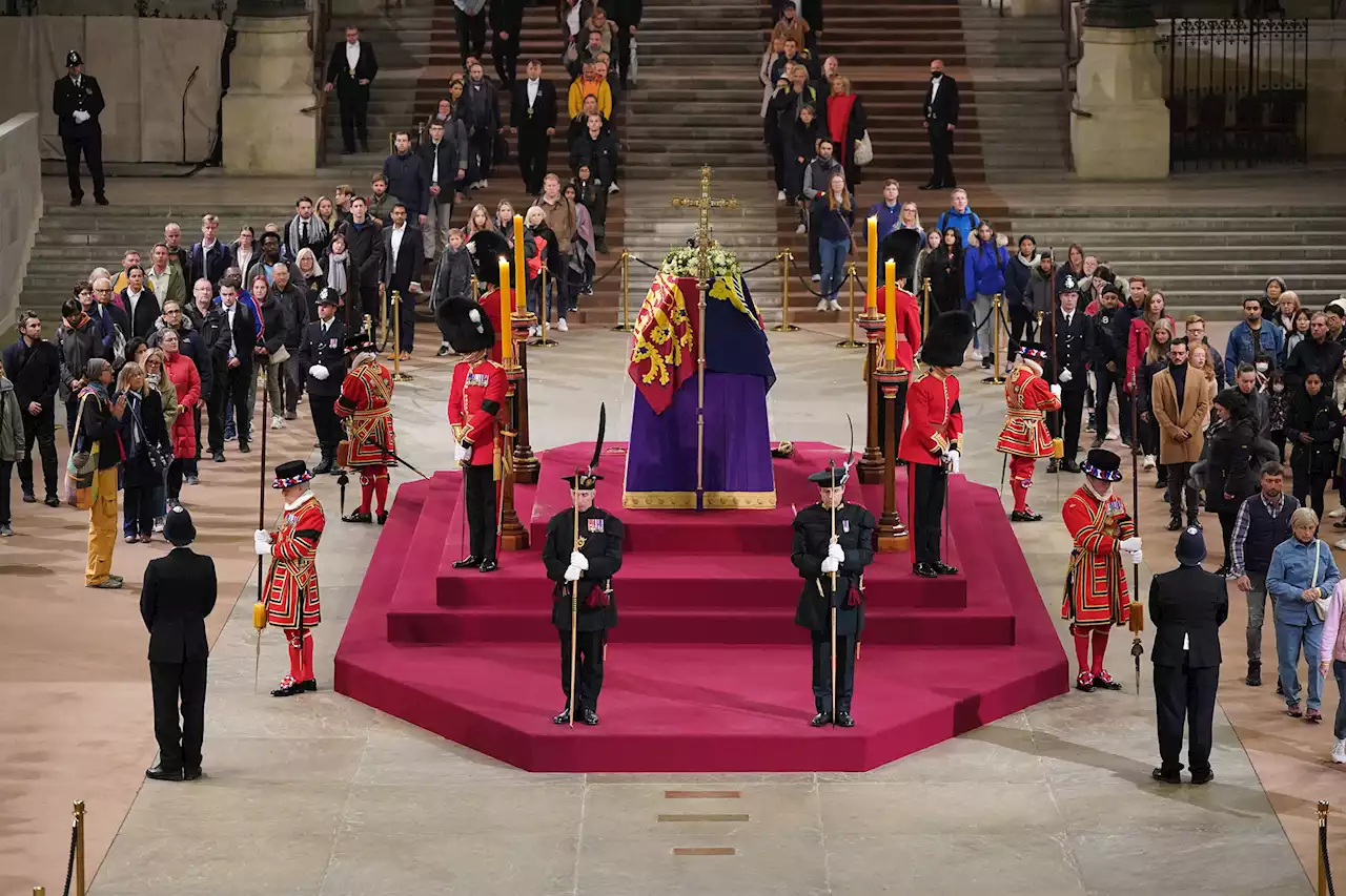 Man arrested for rushing Queen’s casket was checking if she was ‘alive’