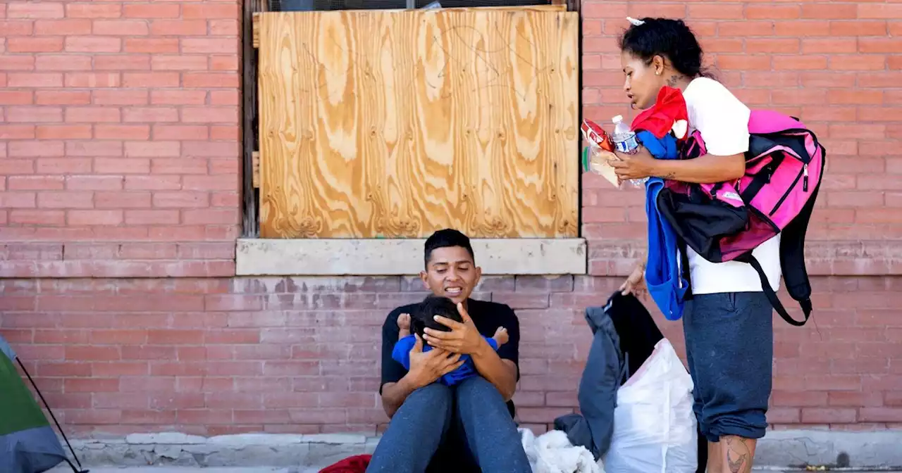 El Paso scrambles to move migrants off the streets and gives them free bus rides as shelters reach capacity