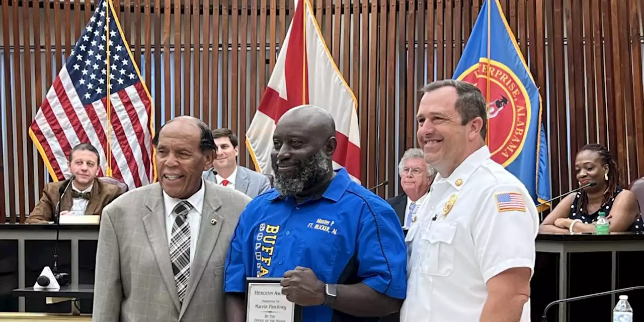 Enterprise man rescued residents from fire, honored by mayor