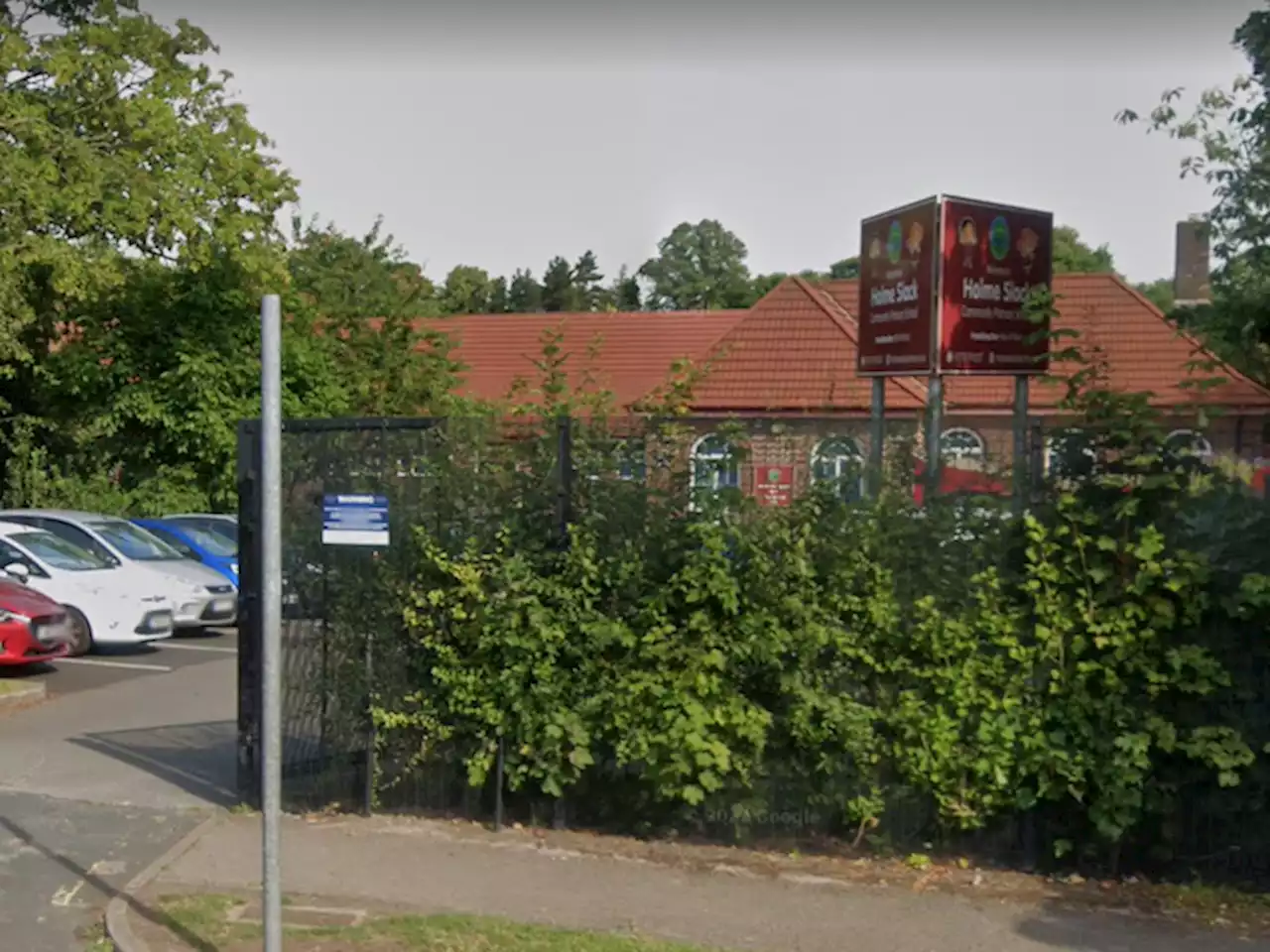 Male seen brandishing machete as children arrive at Holme Slack school gates