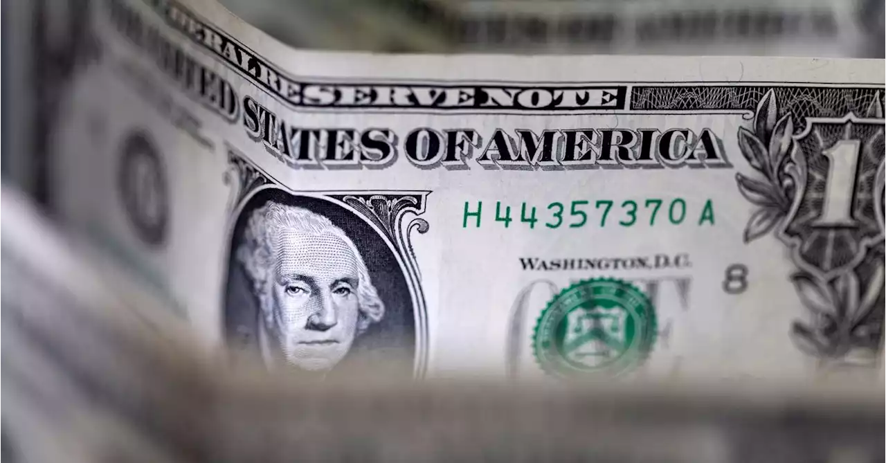 Dollar towering, stocks cowering as Fed hikes higher