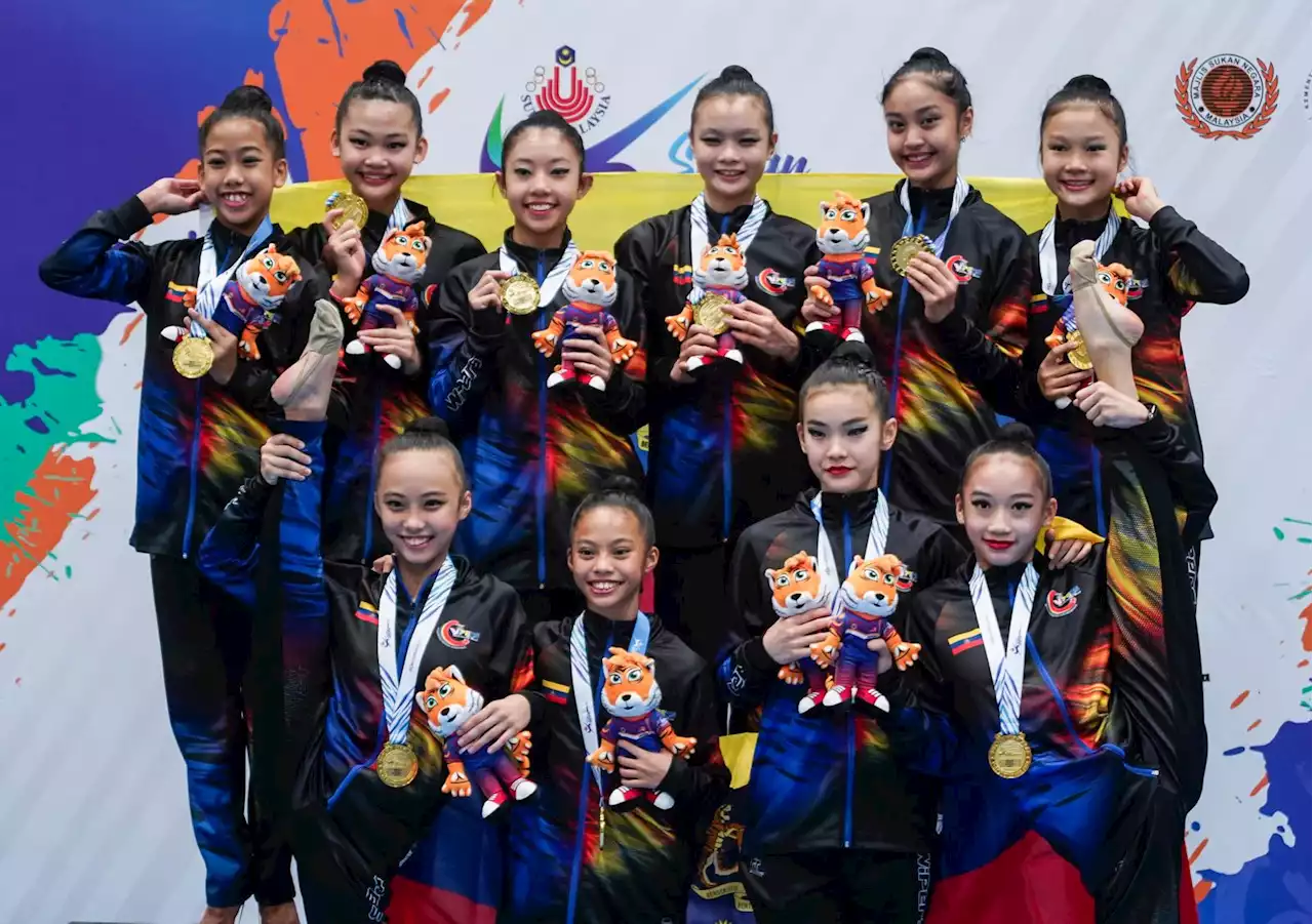 Wipers sapu dua emas gimnastik berirama