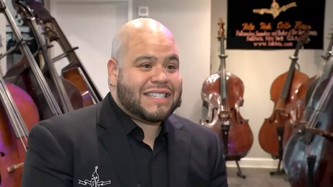 Owner of thriving musical instrument business says he is living the American Dream