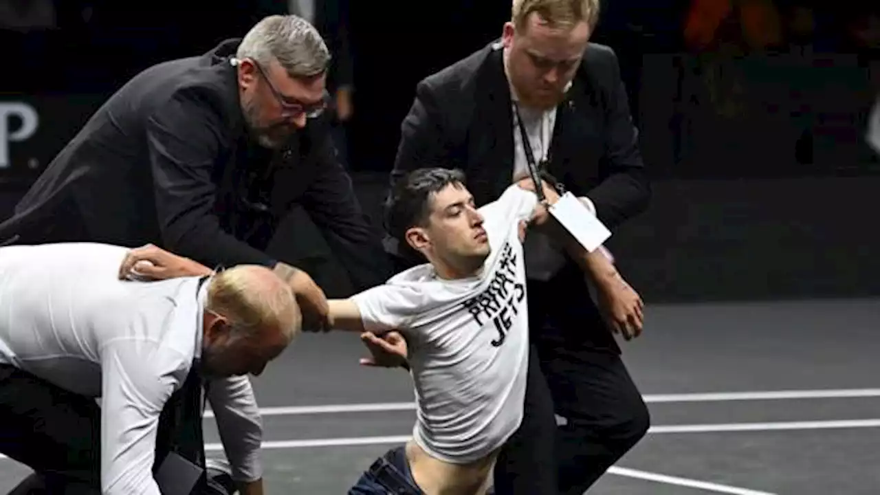 Protester sets arm on fire at Laver Cup