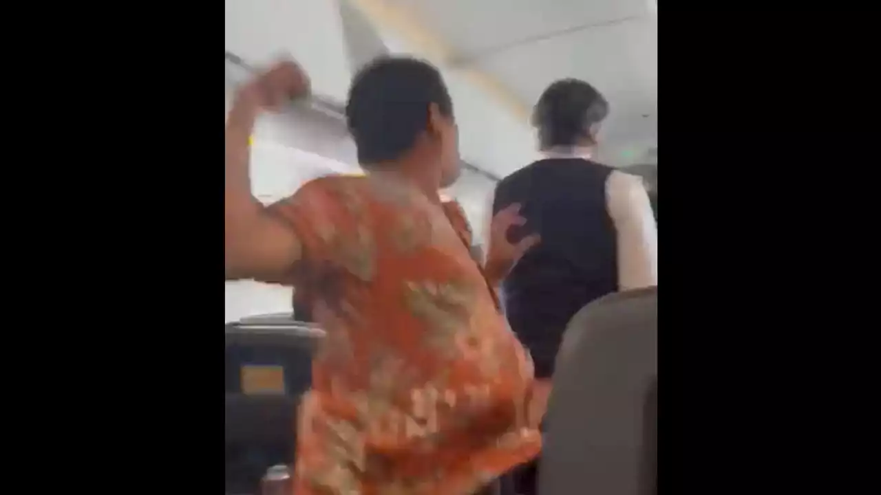 Passenger sucker punches American Airlines flight attendant