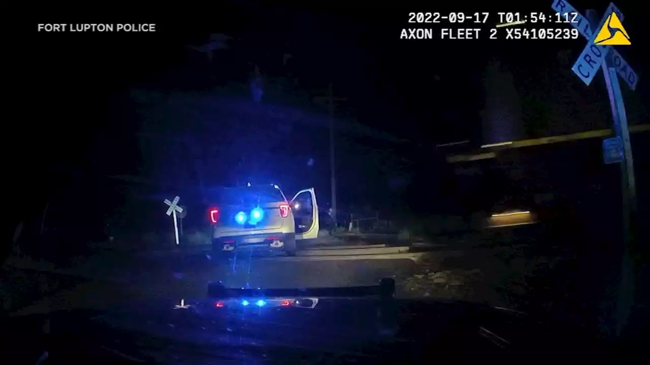 Video: Woman injured when police car she was placed in was struck by train in Colorado