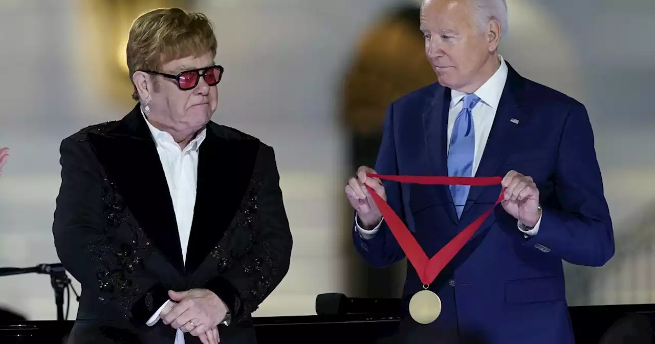 Elton John awarded surprise National Humanities Medal by President Joe Biden