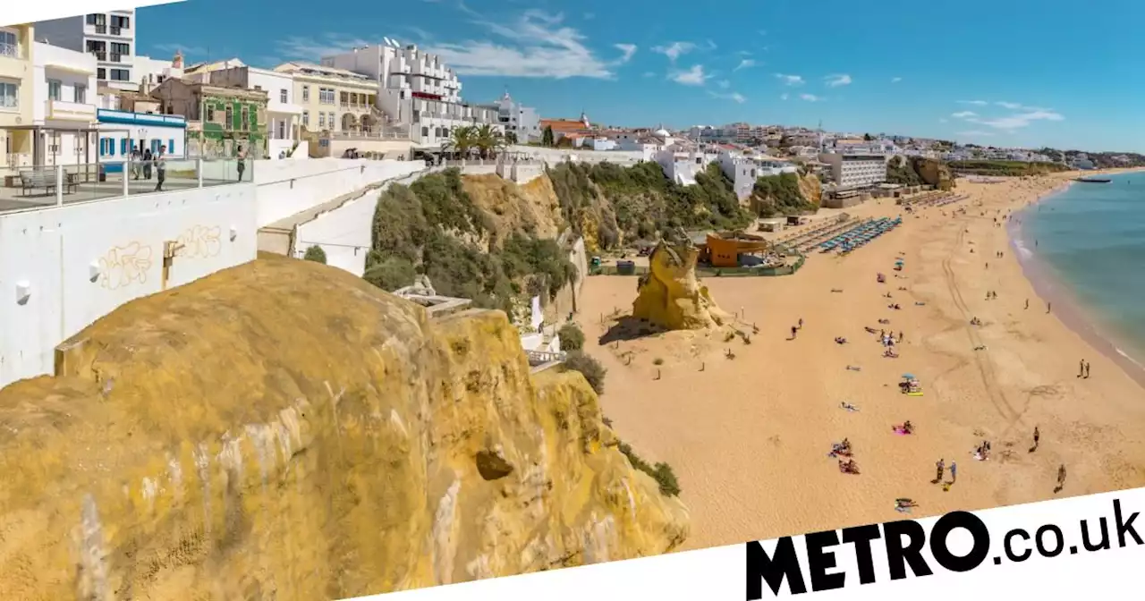 British tourist, 45, dies on beach in Portugal after feeling 'unwell' in the sea