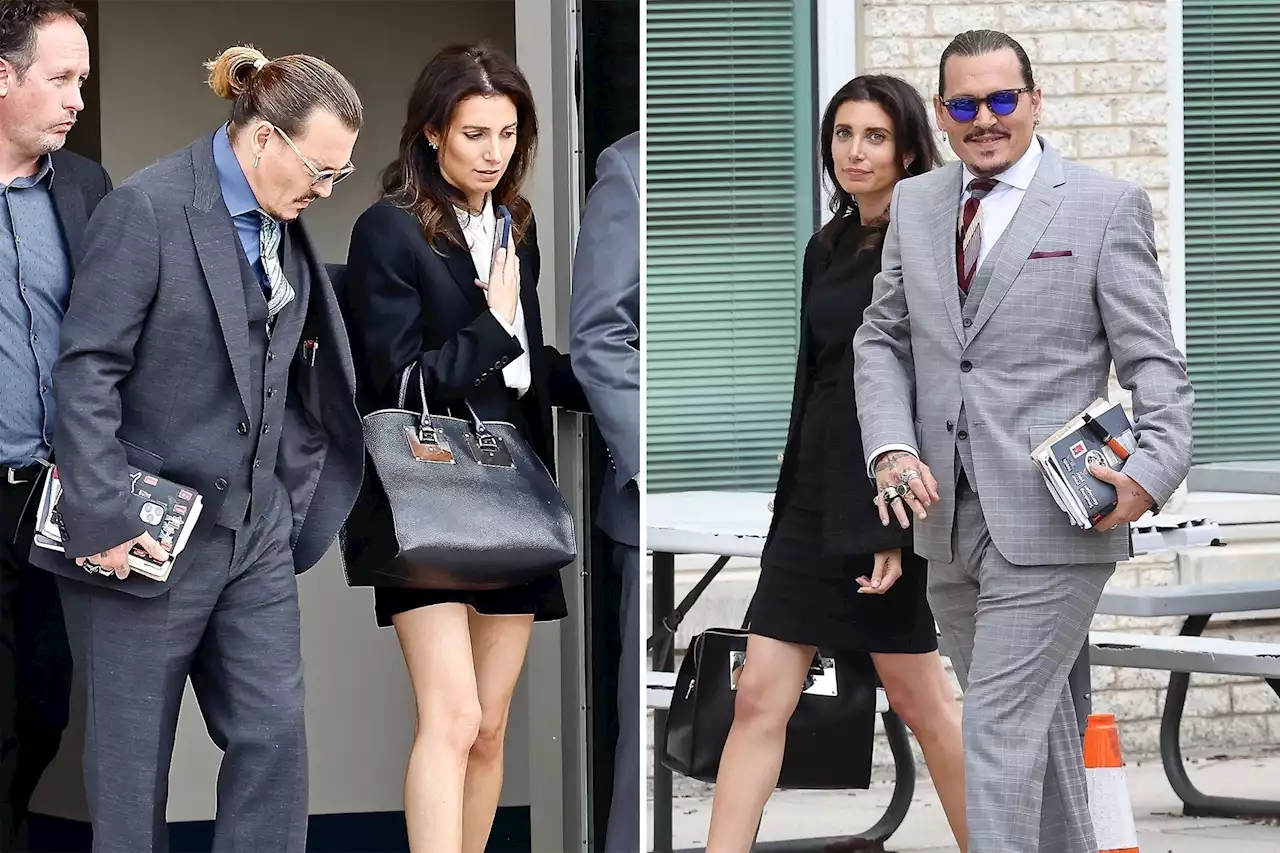 Johnny Depp, lawyer girlfriend cozied up during his Virginia trial, photos show