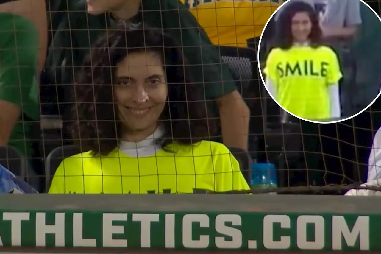 Unflinching fan stares at camera with creepy smile during Mets-A’s game