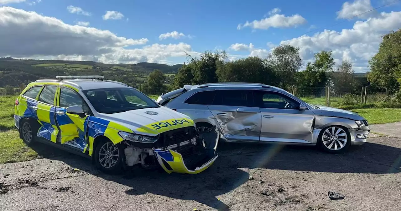 Man charged with attempted murder after three PSNI cars 'rammed by tractor'