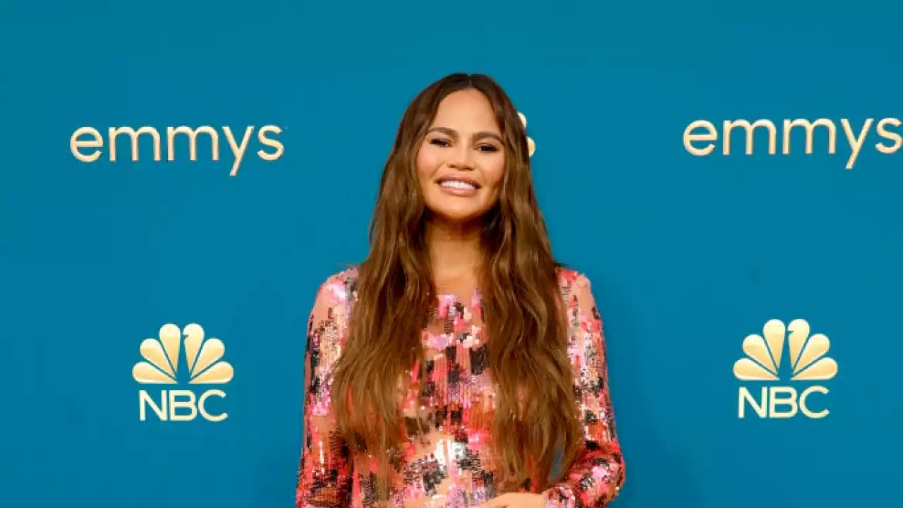 Chrissy Teigen Shows Off Her Baby Bump During Girls Night Out