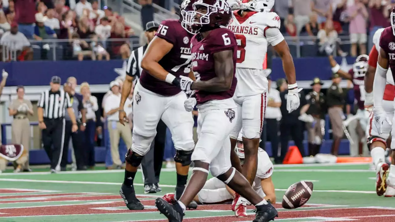 Achane leads No. 23 Texas A&M past No. 10 Arkansas, 23-21