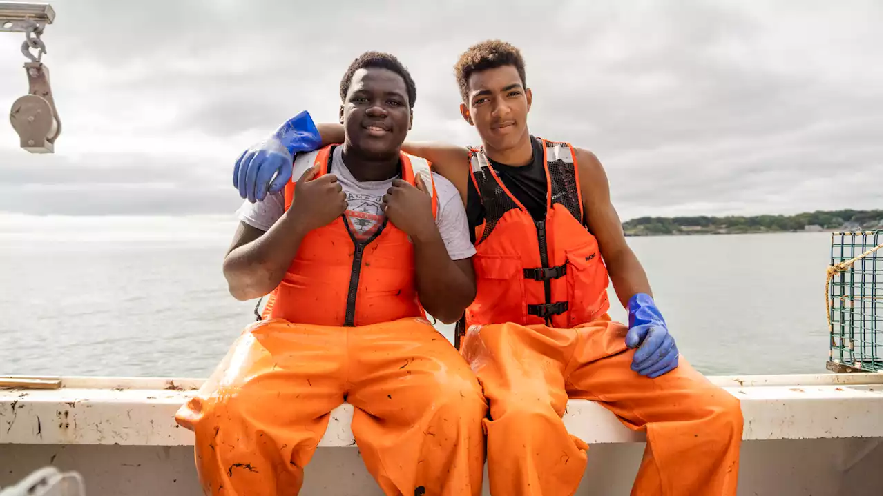 These young men catch more than lobsters. They also catch a break