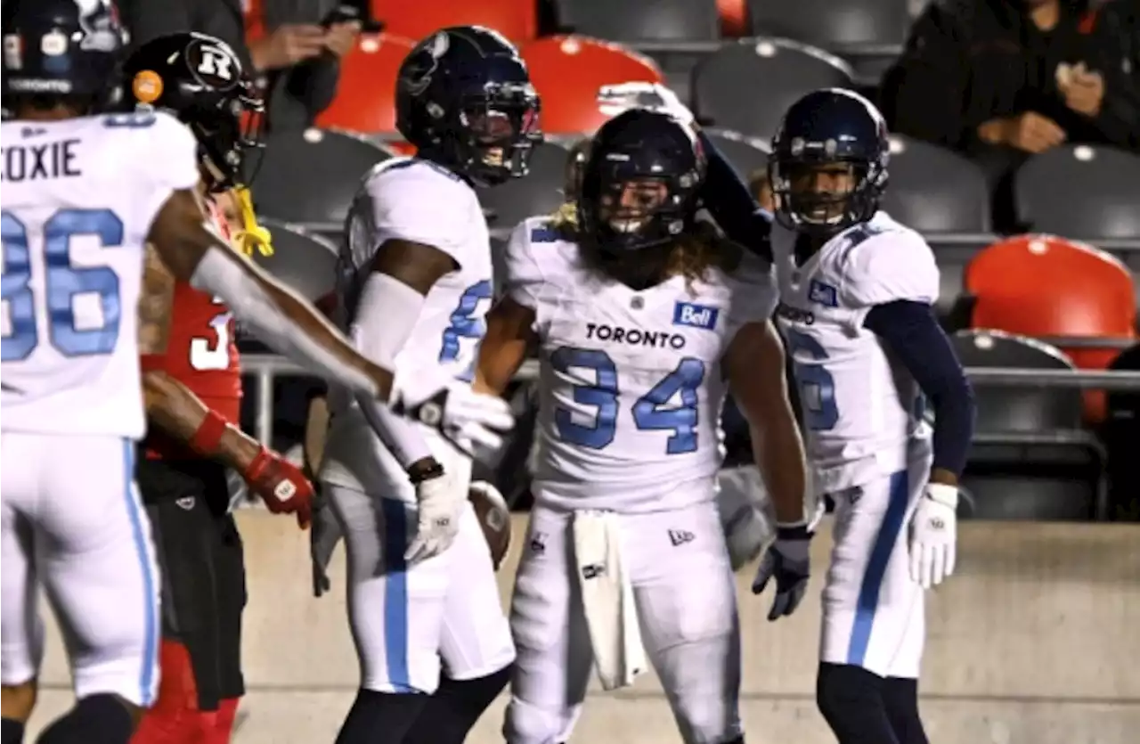 Argonauts clinch playoff berth by crushing Redblacks in Ottawa - TSN.ca