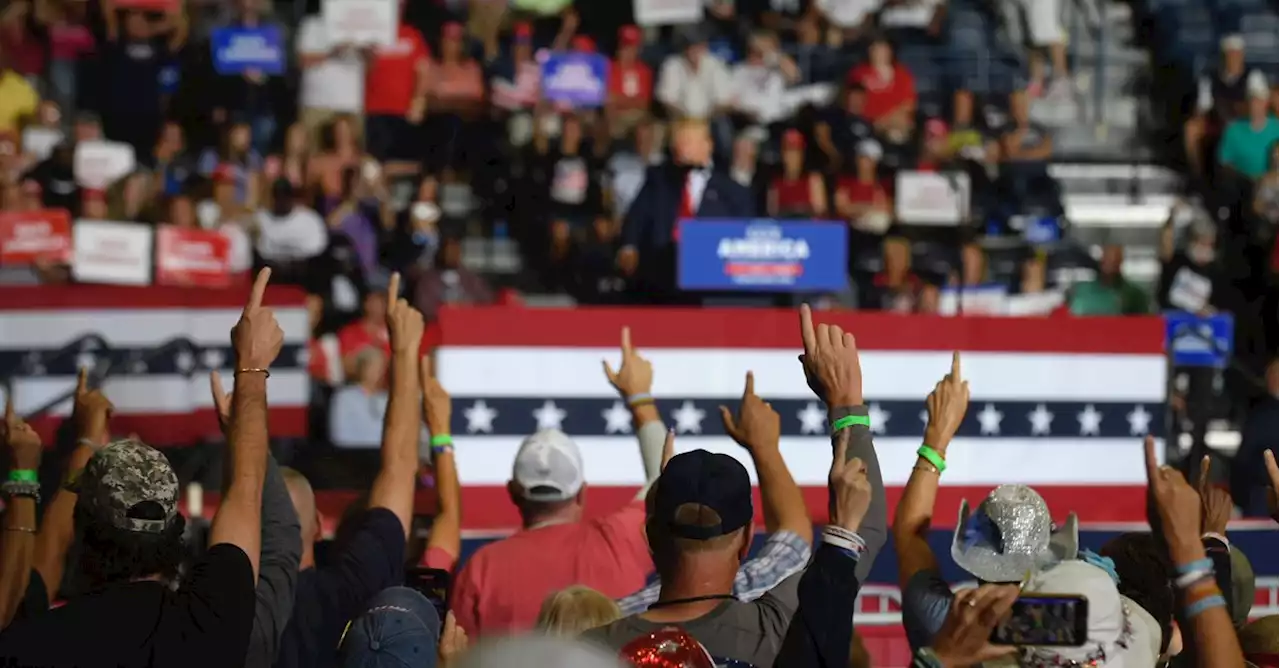 Donald Trump embraces QAnon again at North Carolina rally as ties to violence raise concern