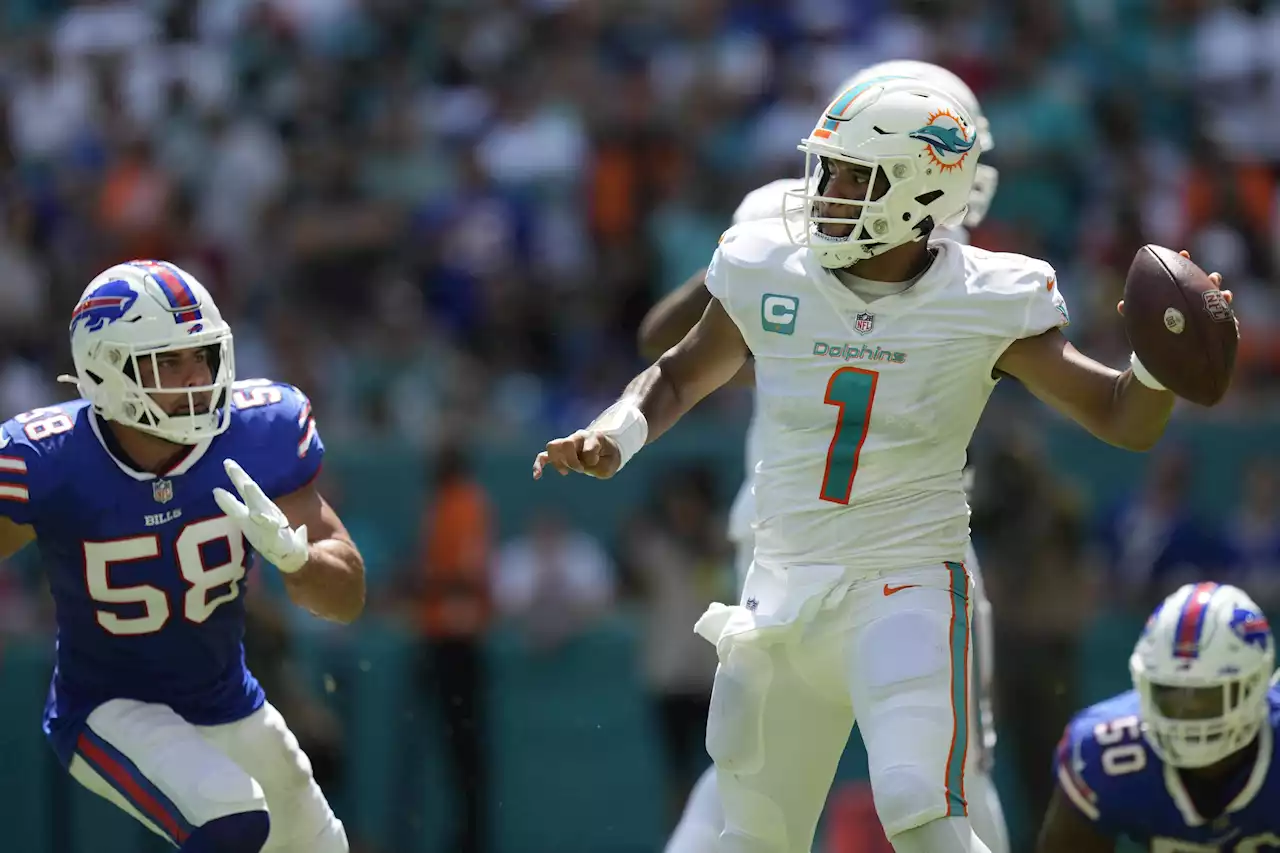 Dolphins halt Allen, survive 'butt punt' to beat Bills