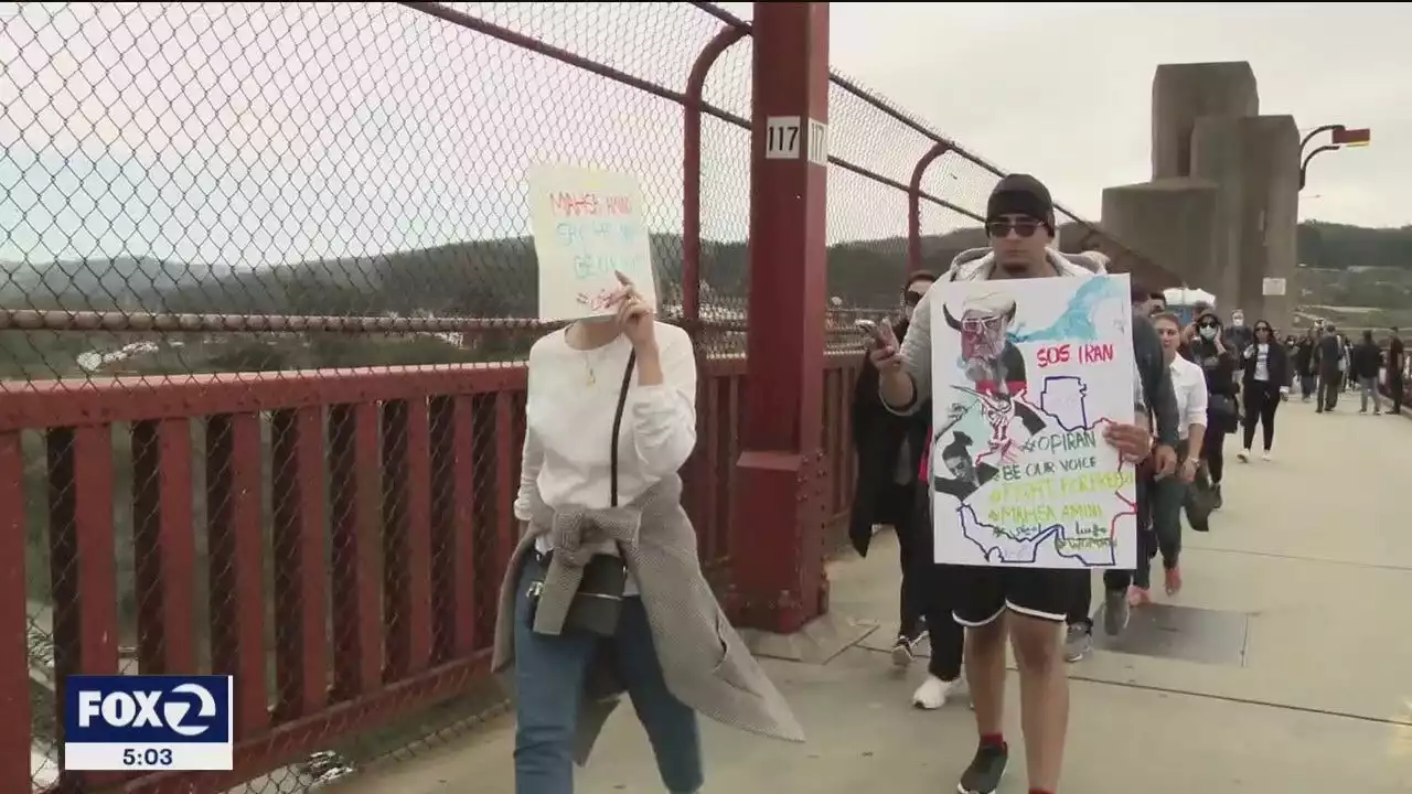 Demonstrators line the Golden Gate Bridge to protest the government of Iran