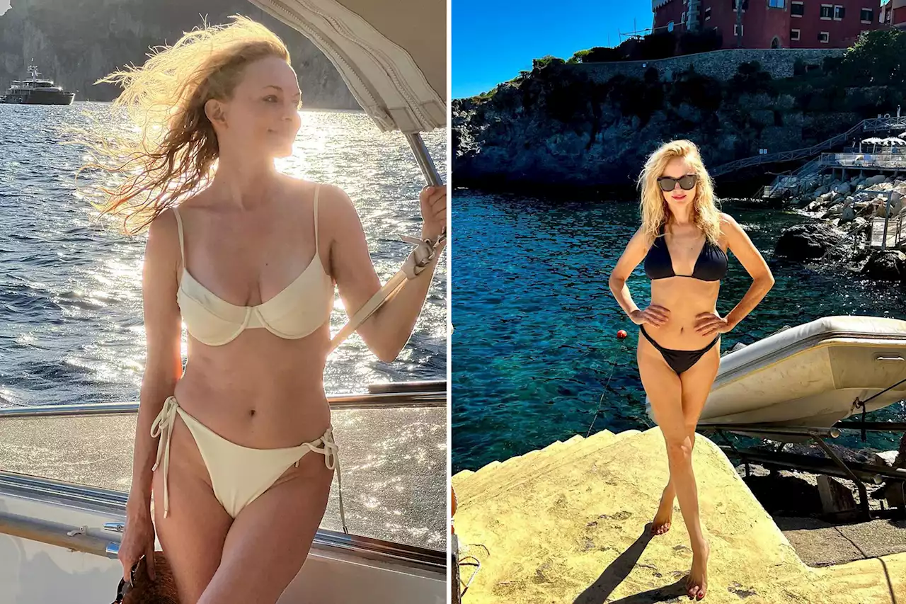 Heather Graham, 52, soaks up the sun in a cream bikini during Italian getaway