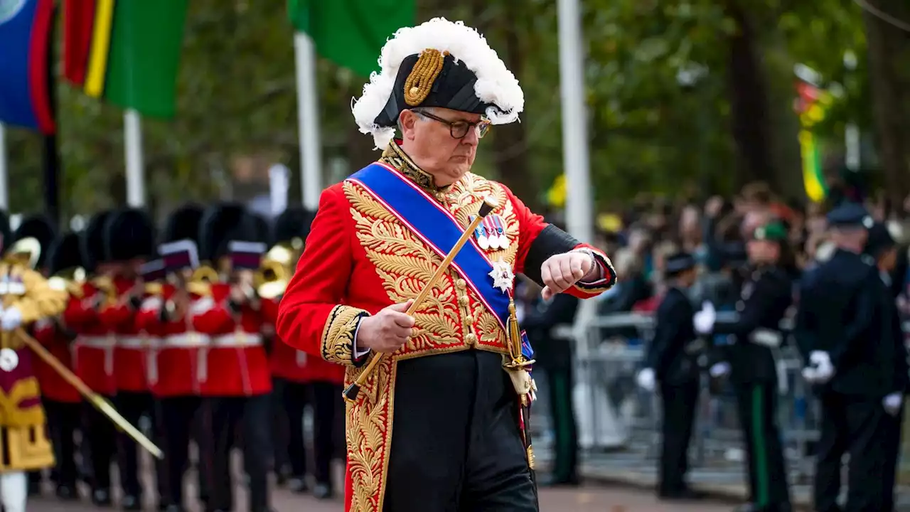 Peer who organised Queen's funeral banned from driving for using phone behind wheel