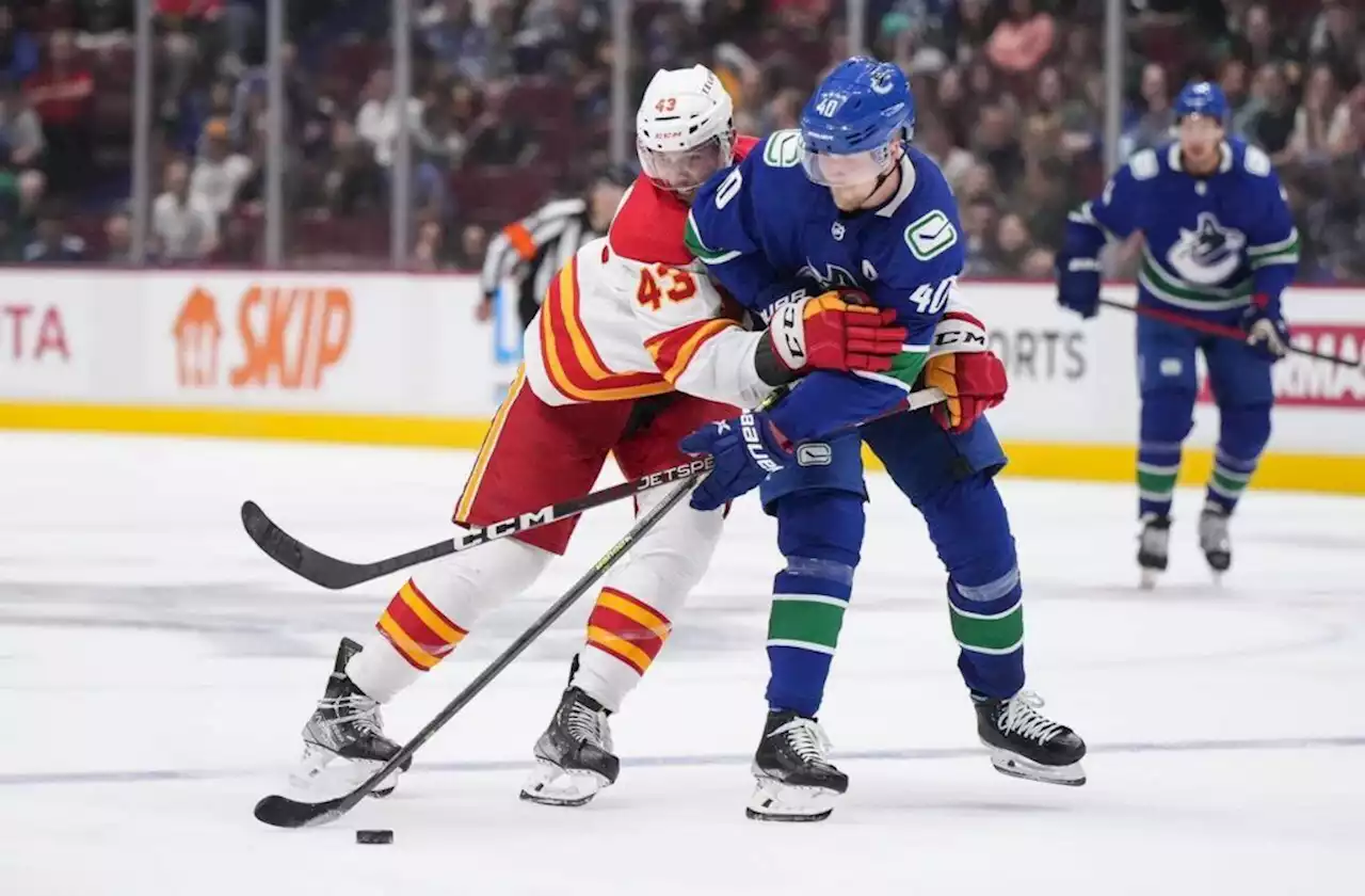 Stone scores in OT as Flames take 3-2 overtime win over Canucks – Terrace Standard